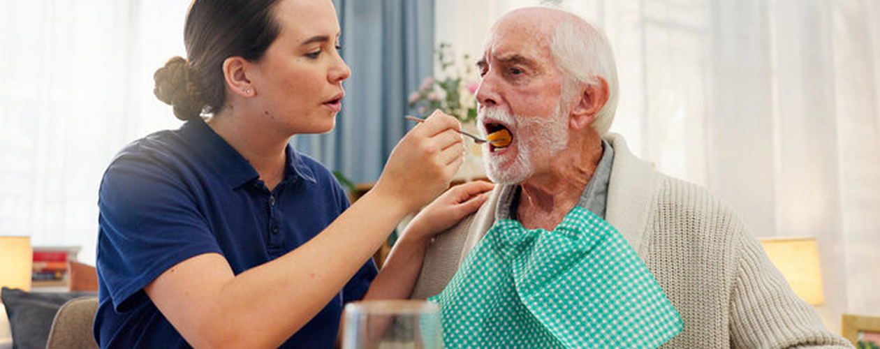Elderly woman and doctor